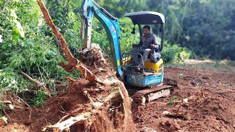 removing large stumps with mini excavator|stump removing machine.